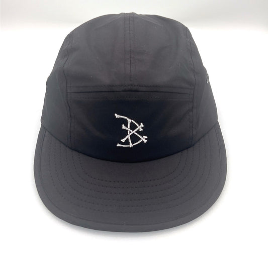 Black BAIT 5 Panel Hat with white bones logo on front panel, white background.