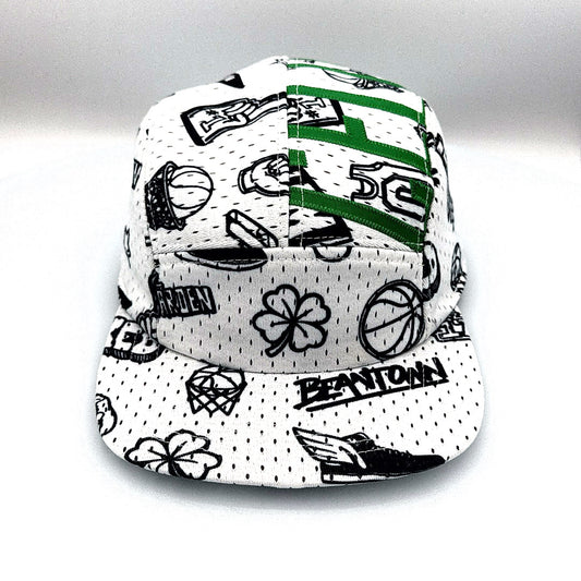 White and green Mitchell & Ness Larry Bird jersey upcycled to a 5-Panel Hat.