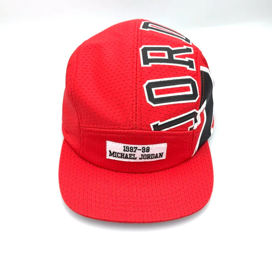 Upcycled red and white MJ jersey to 5 Panel Hat, JORDAN stitched on top, 23 on the side, white background.