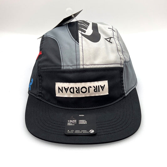 Black, grey and white Air Jordan NIKE 5 Panel Hat, inverted Air Jordan logo on front, white background.