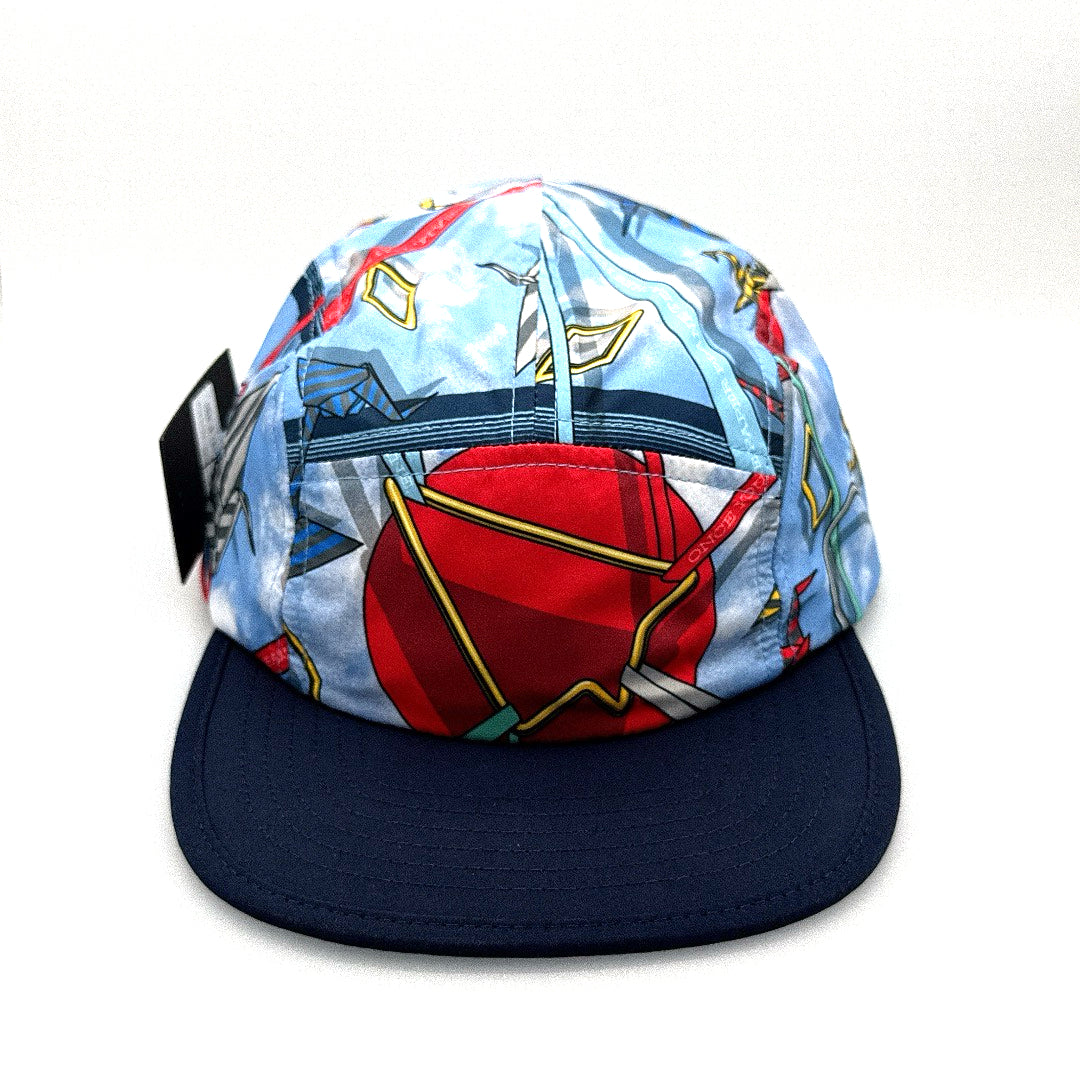 Nylon Navy, red and baby blue Paper Planes 5 Panel Hat, with a white background.